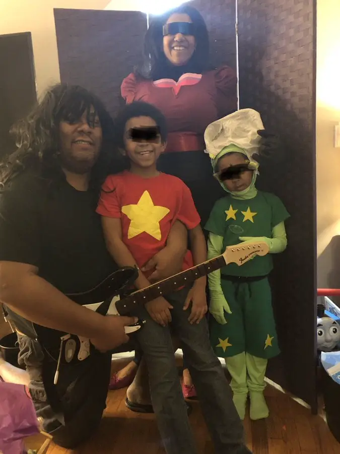 Elie Mystal enjoying halloween with his wife and two kids