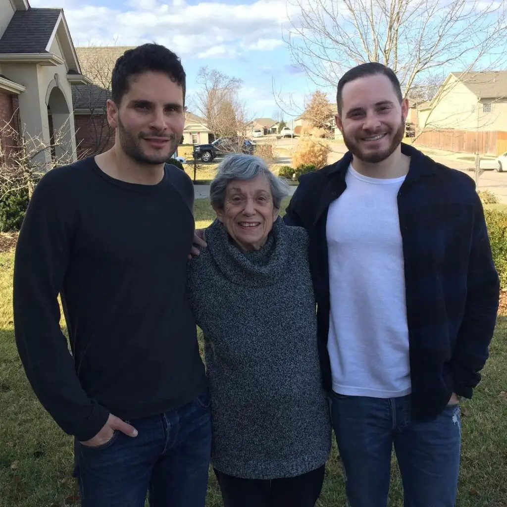 With his grandma and brother