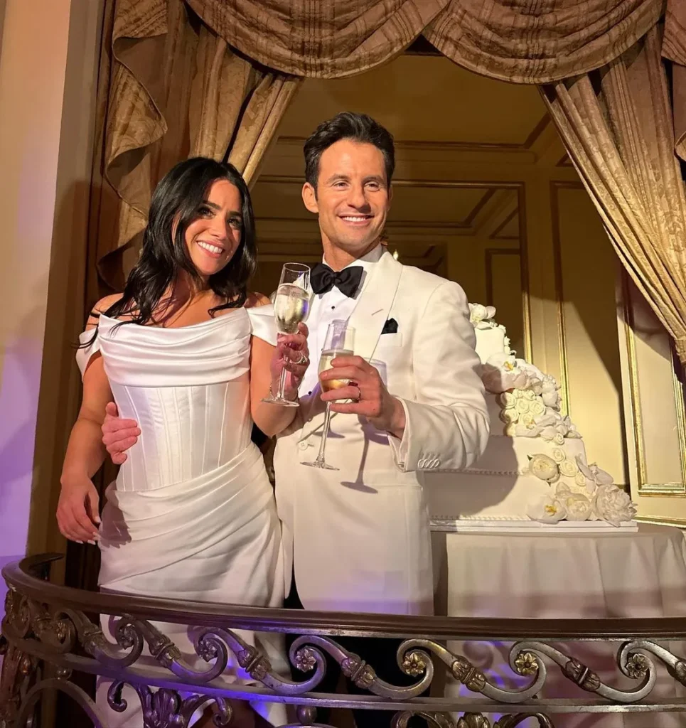 weber-and-his-wife-raise-a-glass-of-wine-at-their-wedding