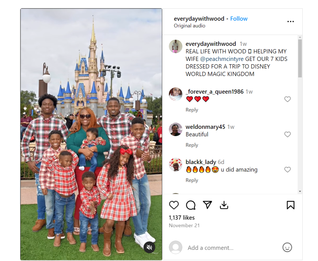 mcintyre-and-her-husband-with-their-seven-kids-on-Disney-Land
